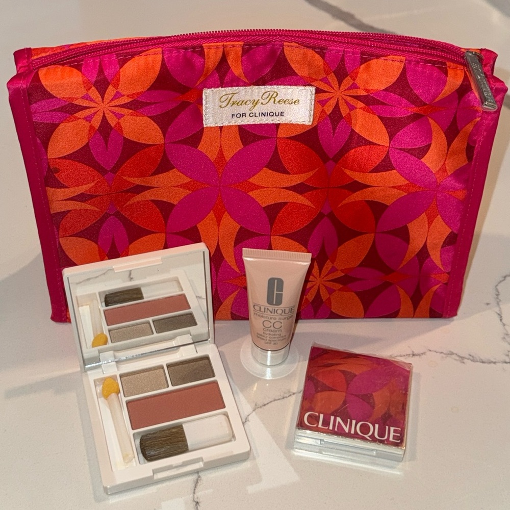 NEW Clinique 4pc SET: 2pc eye shadows sets, 1pc CC cream 1pc rare cosmetic bag